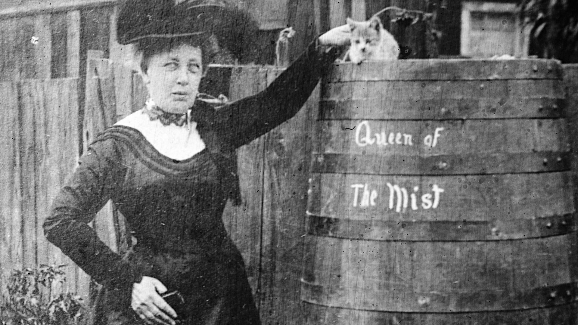 Annie Edson Taylor, first person to go over Niagara Falls in a barrel and survive; cat in photo is likely the same cat that went over the falls in a test run. Published in: Over the Falls: Annie Edson Taylor's story of her trip: how the Horseshoe Fall was