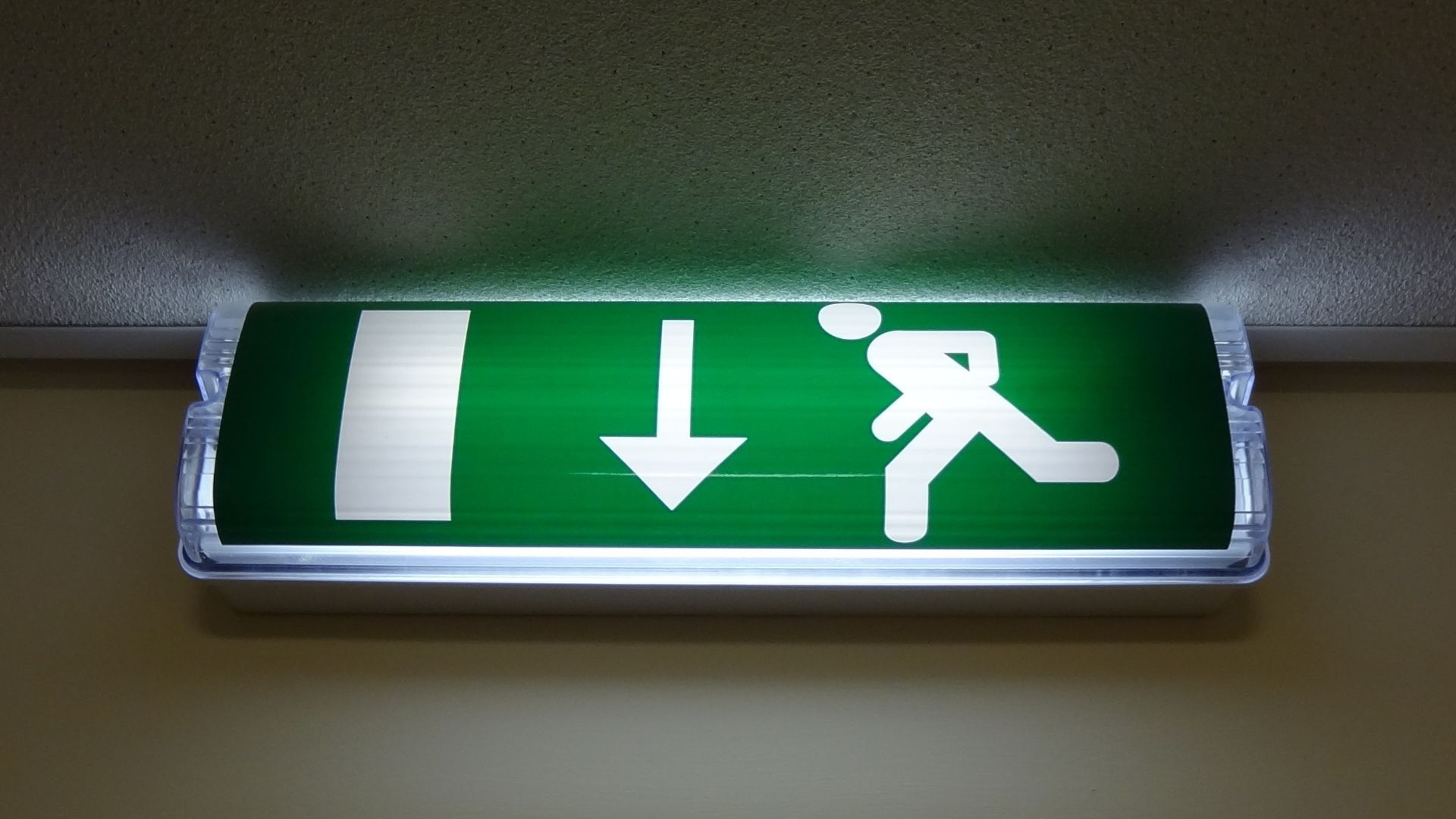 Emergency exit light sign in the UK