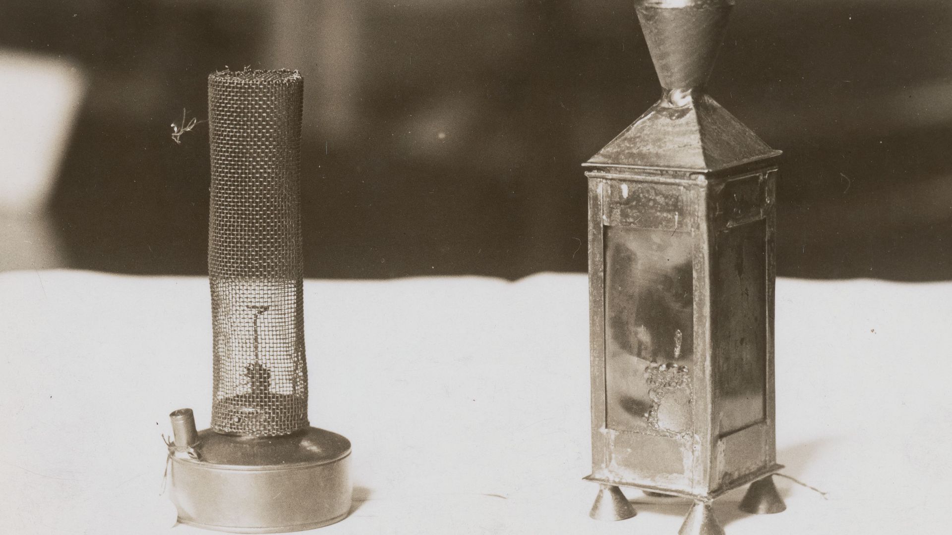 Davy's first safety lantern, 1815, and early wire gauge safety lamp, Science Museum, South Kensington, Acme Newspictures, c. December 1929, from the Digital Commonwealth - 1 22 10 001309 0004 A. Note: this original caption appears incorrect; the Davy lamp