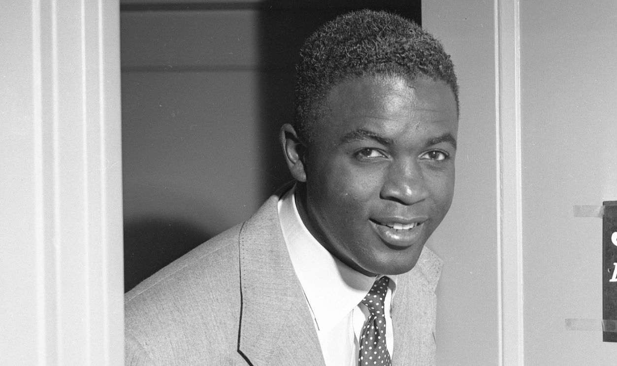 Jackie Robinson checks his office door as he begins a new job with NBC television on February 15, 1952 in New York City.