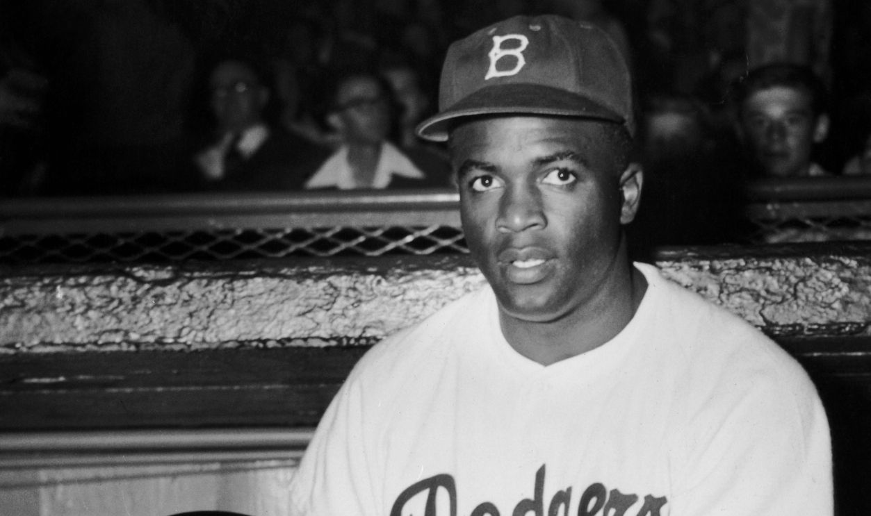 Jackie Robinson with his National League's Most Valuable Player award from the baseball writers asscoiation, July 1950. He is only the fourth Brooklyn Dodgers player to win the award.