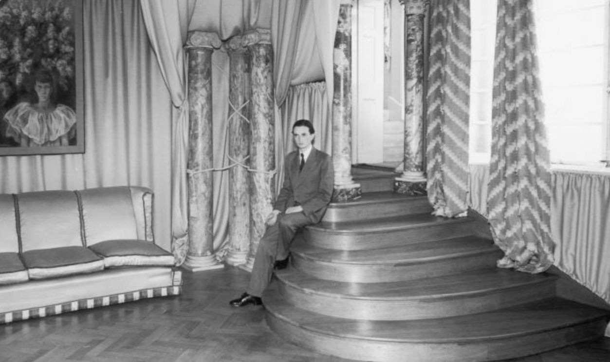 Millionaire art collector Edward James in the unusual home he shares with his wife, dancer Tilly Losch, 1933. The house is at Monkton near West Dean in South East England.