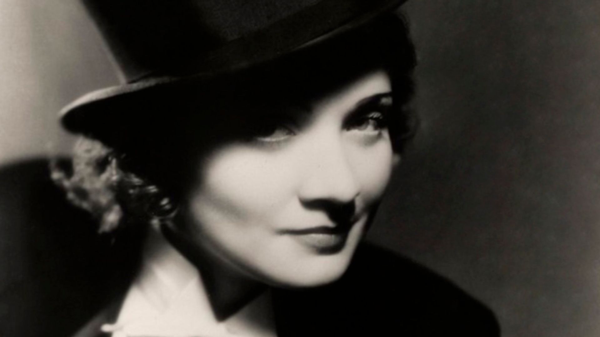 Morocco (film) 1930 Josef von Sternberg, director. 
Marlene Dietrich, cross dress, top hat.

Paramount Pictures.