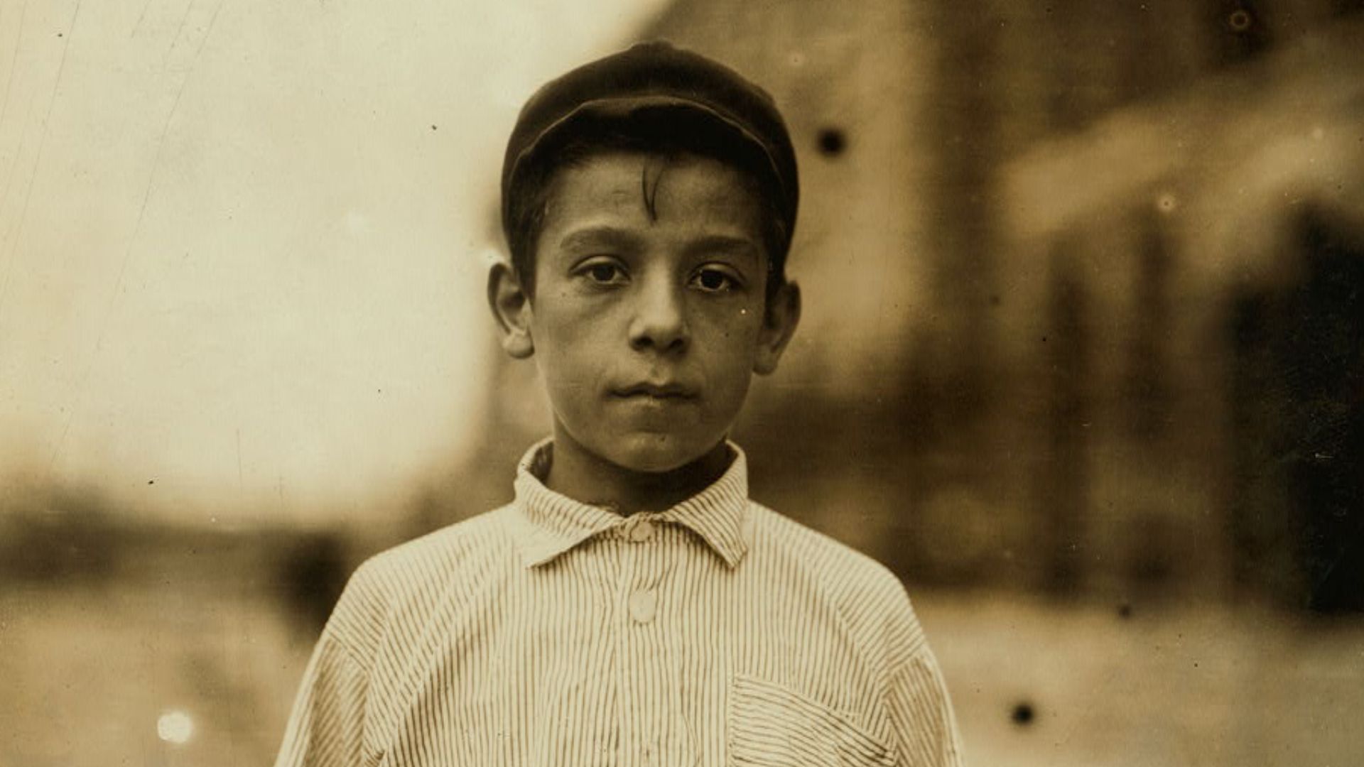 Title: Leopoldo Andrioli, 208 Elm Street, in spinning room of the Ayer Mill. See also 2490.
Abstract: Photographs from the records of the National Child Labor Committee (U.S.)
Physical description: 1 photographic print.

Notes: Boys.; Textile mill workers
