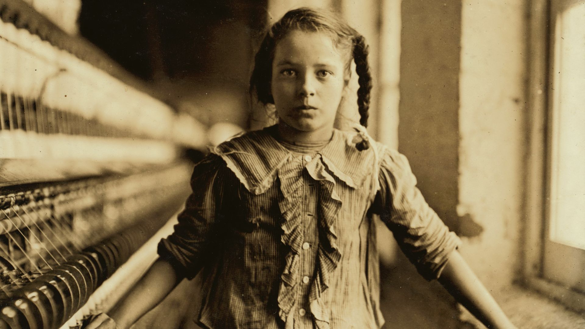 Title: One of the spinners in Whitnel Cotton Mfg. Co. N.C. She was 51 inches high. Had been in mill 1 year. Some at night. Runs 4 sides, 48 cents a day. When asked how old, she hesitated, then said