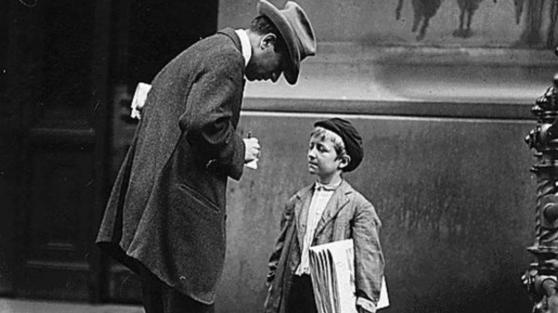 Boy selling newspapers by Lewis Hine (1874-1940)