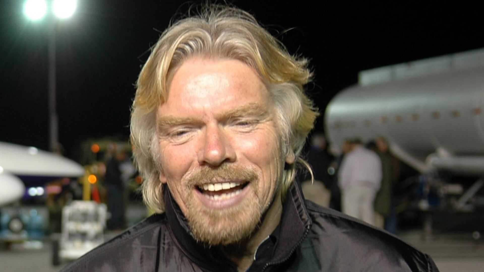 KENNEDY SPACE CENTER, FLA. - During fueling of the Virgin Atlantic GlobalFlyer before dawn on NASA Kennedy Space Center’s Shuttle Landing Facility (SLF), Sir Richard Branson talks to the media.  Branson is chairman and founder of Virgin Atlantic. The Glob