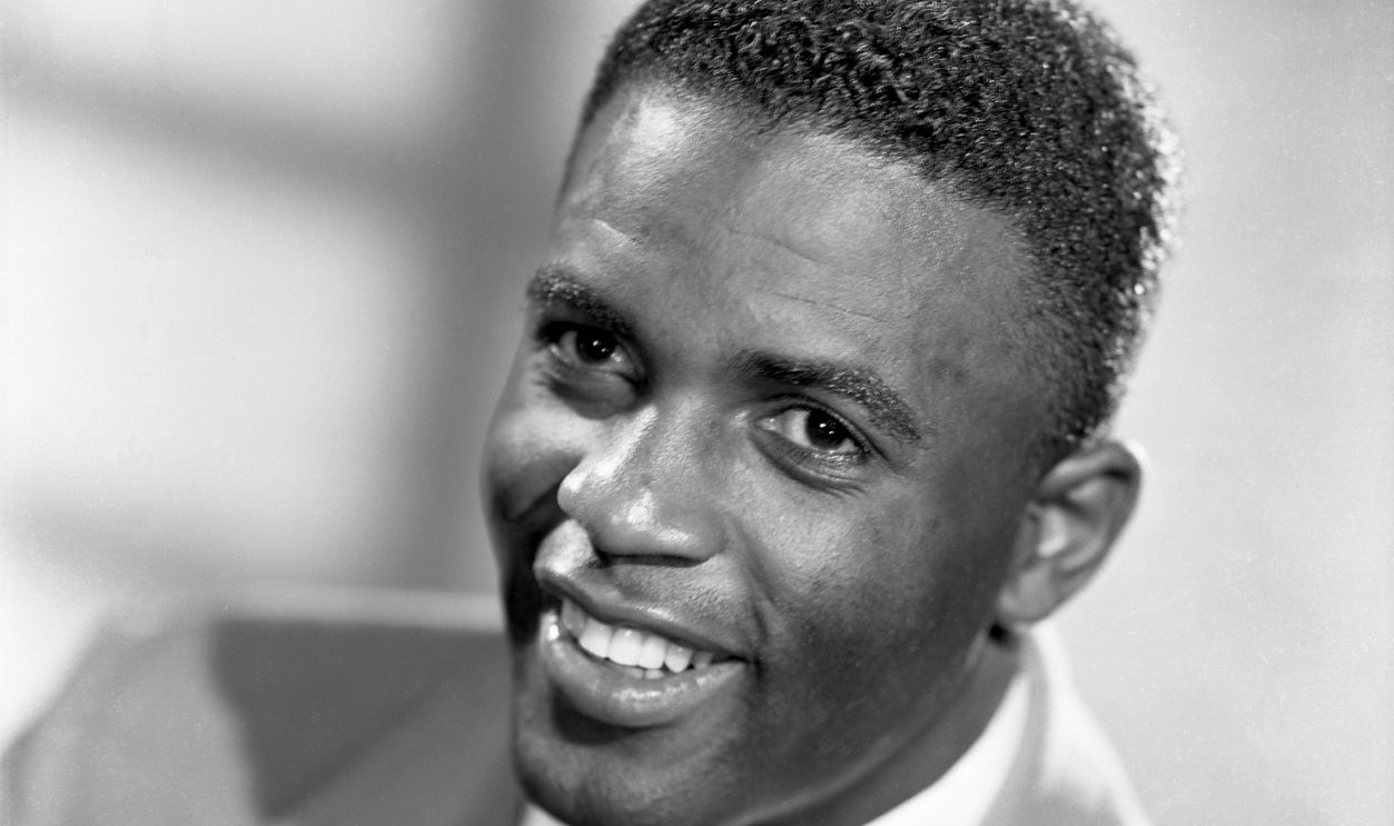 Jackie Robinson number 42 of the Brooklyn Dodgers poses for a portrait circa 1955 in New York City, New York.