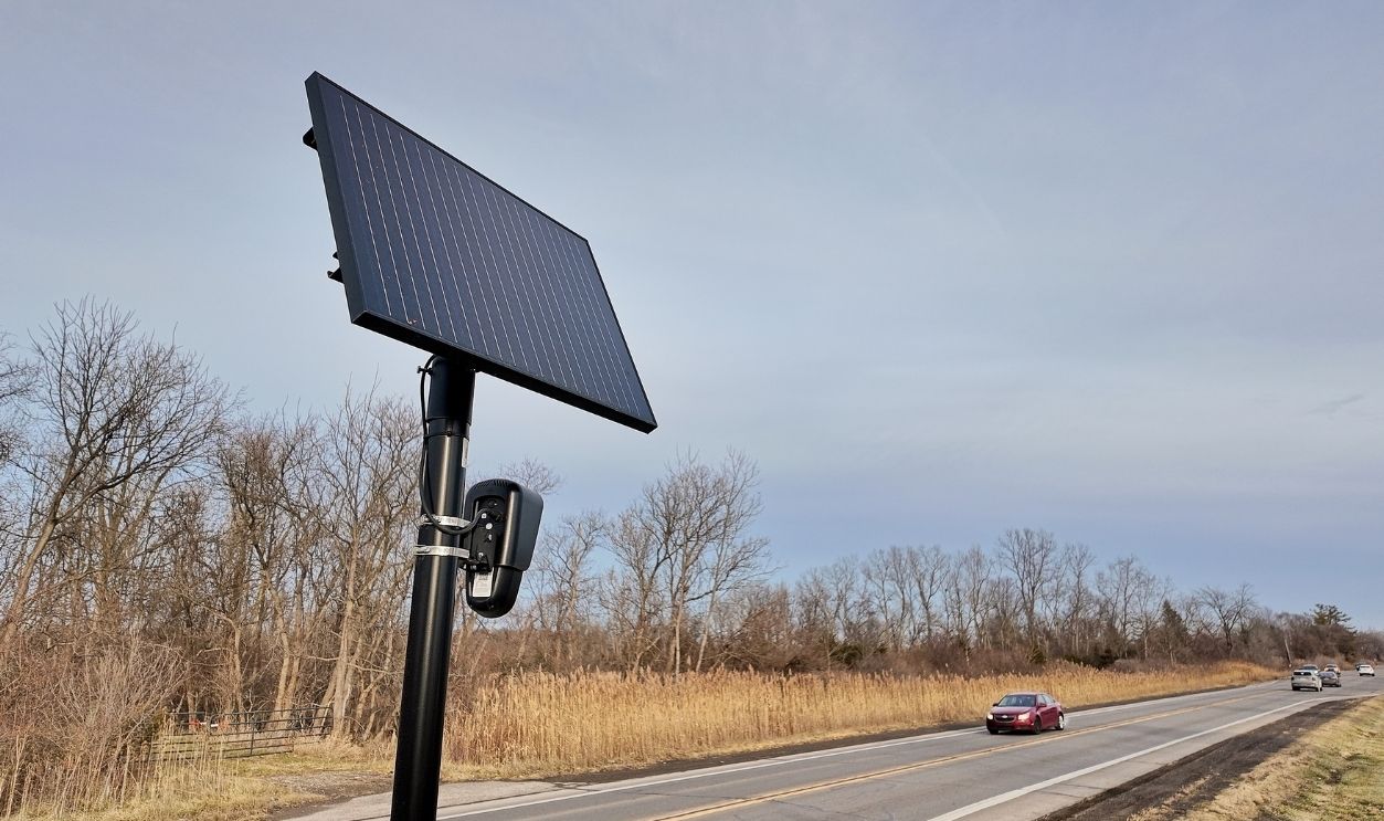 Carleton, Michigan - Dec 29, 2025: Flock Safety camera on Will Carlton Rd is positioned to read license plates of cars