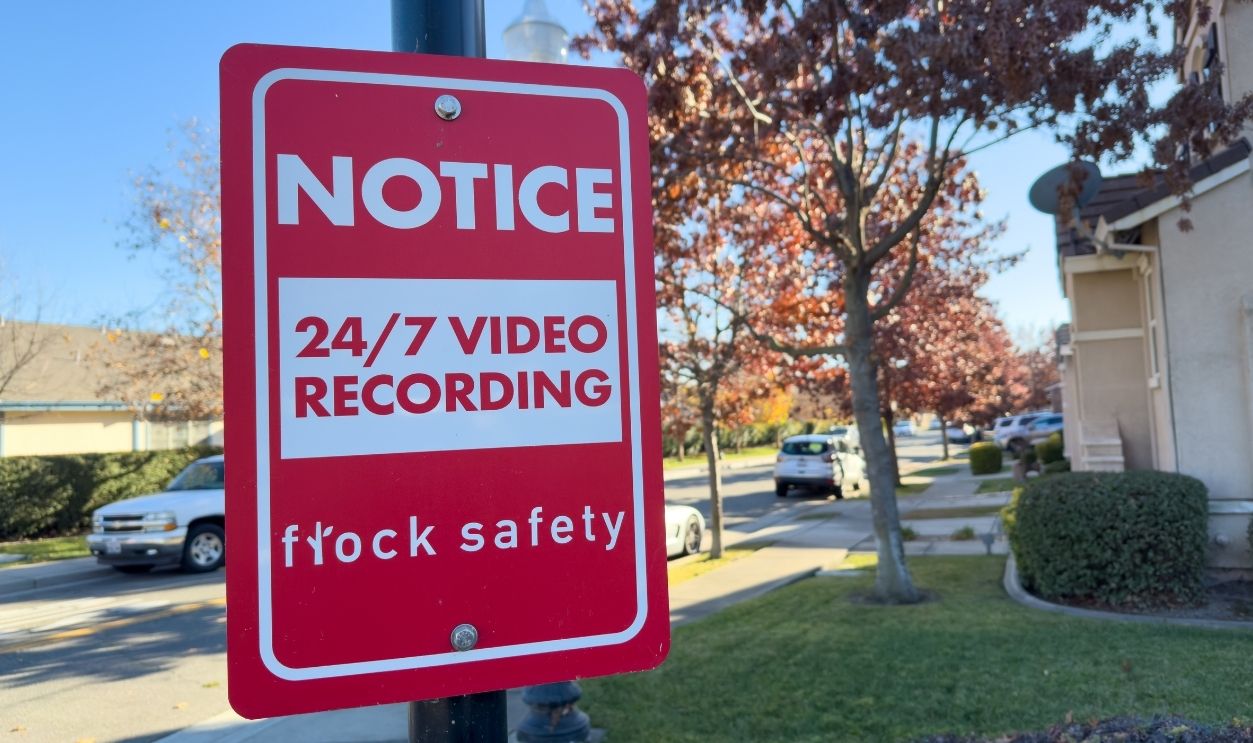 Los Angeles, CA - Dec 18, 2023: Notice sign of 247 video recording in an HOA community by Flock Safety.