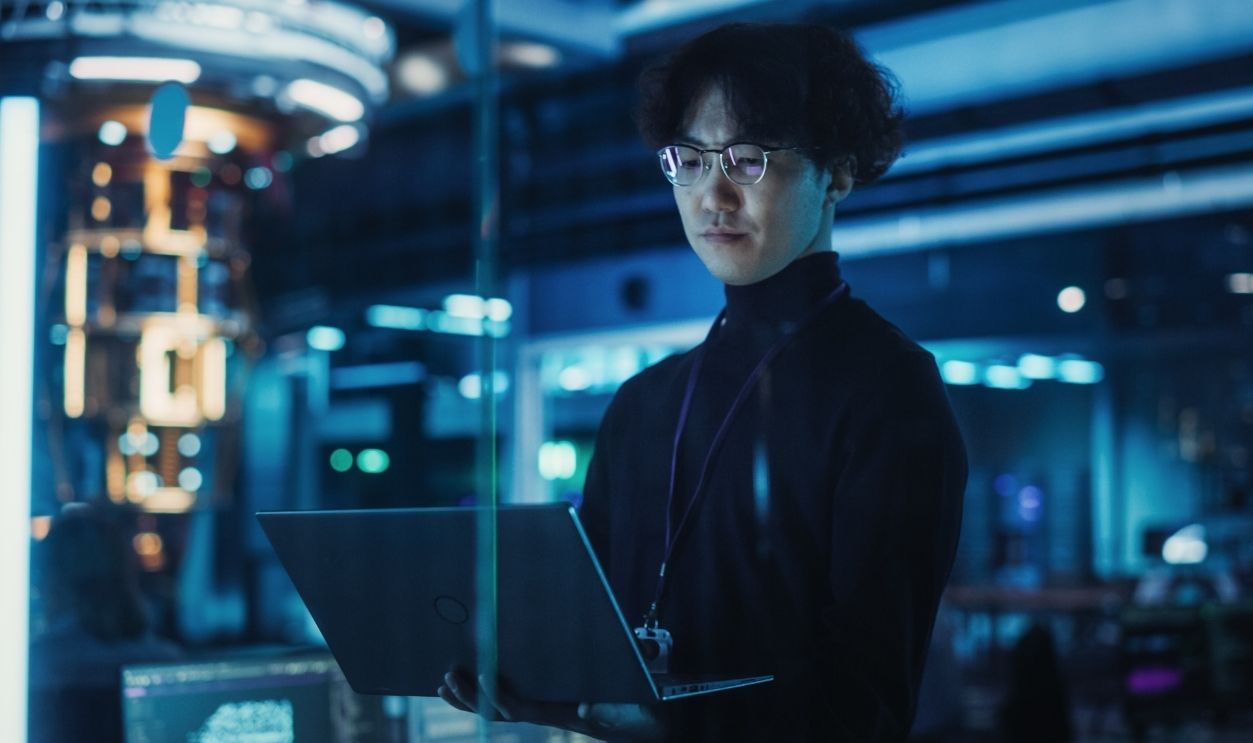 Young Computer Scientist Develops Quantum Machine Learning Algorithms, Using a Laptop Computer to Simulate and Test Their Performance. Asian Specialist Optimizing Software Parameters Online