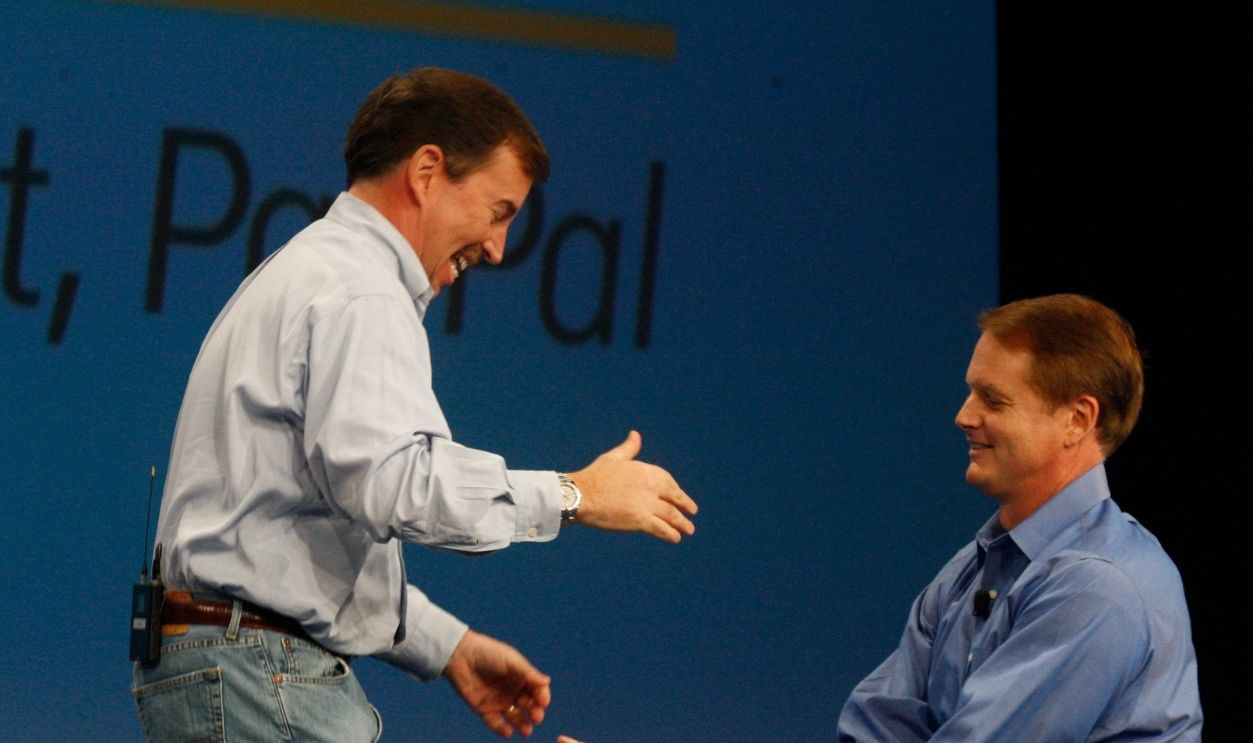 Scott Thompson (l to r), President Paypal and John Donahoe, Chief Executive Officer, eBay Inc., greet each other on stage during the keynote address at the Paypal developers conference at the Concourse Exhibition Center in San Francisco, Calif. on Tuesday