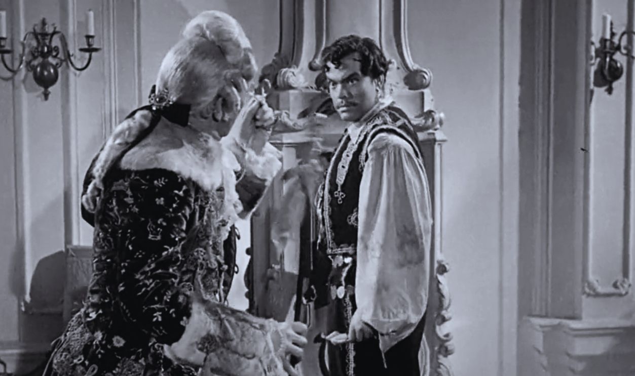 Screenshot from Black Magic (1949)