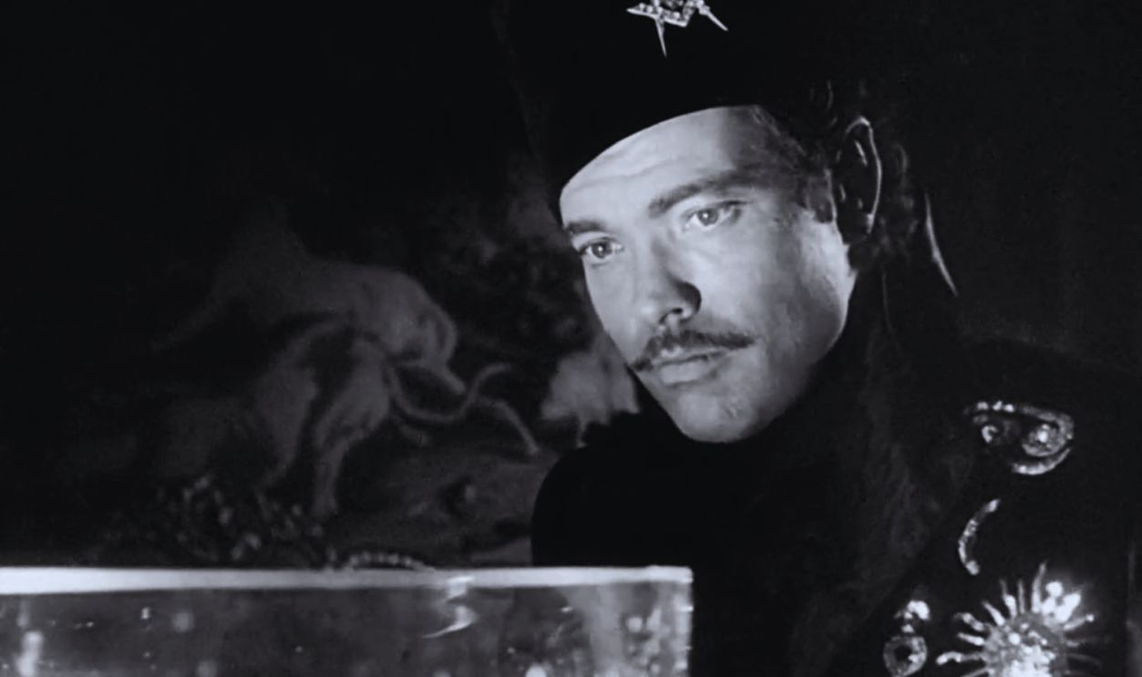 Screenshot from Black Magic (1949)