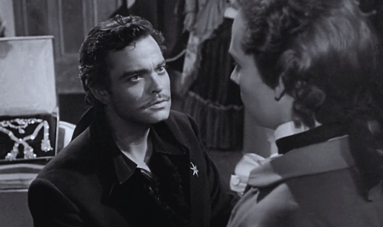 Screenshot from Black Magic (1949)