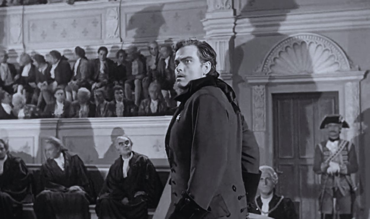 Screenshot from Black Magic (1949)