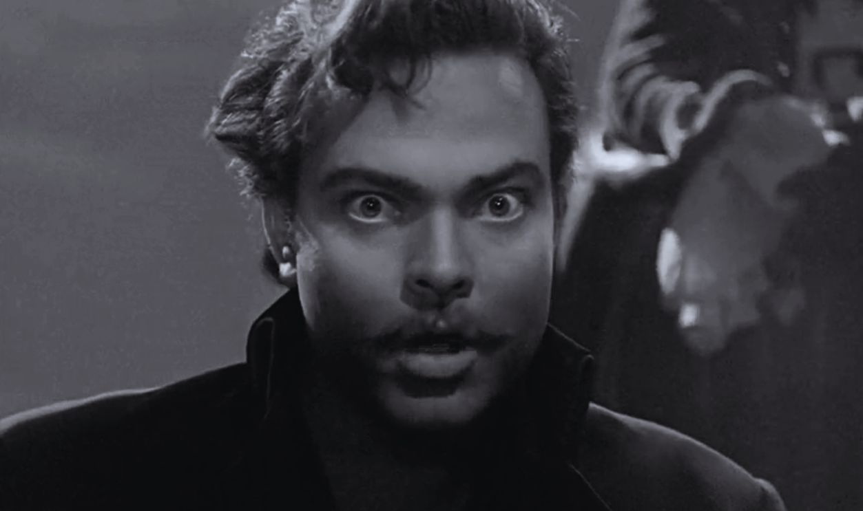 Screenshot from Black Magic (1949)