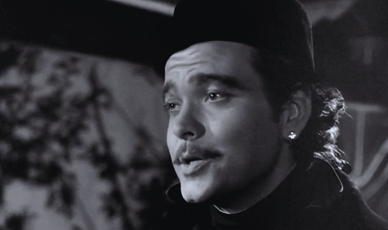 Screenshot from Black Magic (1949)