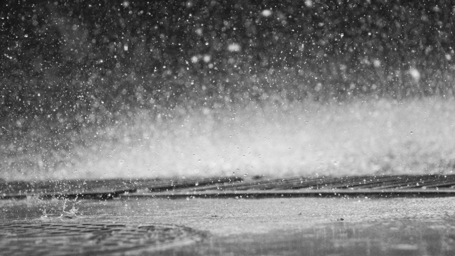 grayscale photo of raindrops