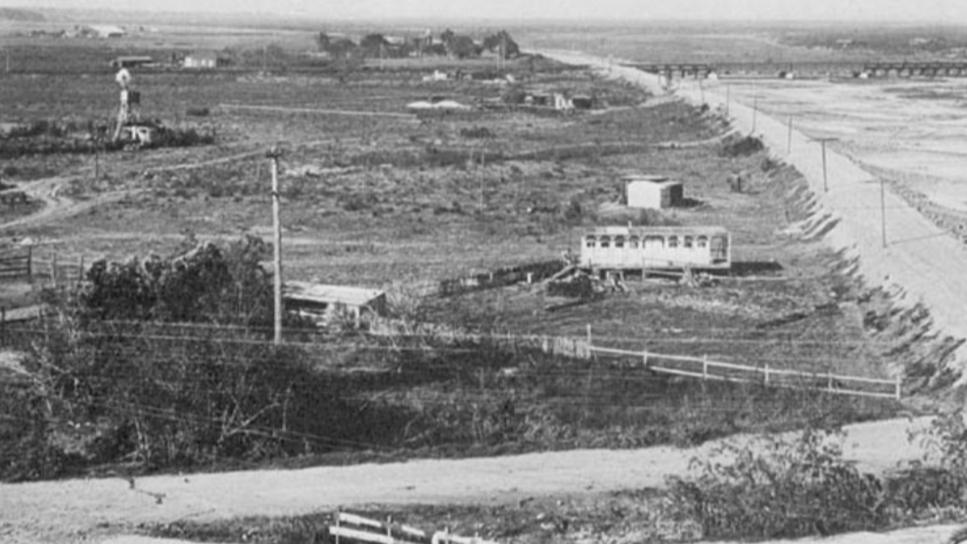San Diego River and Derby Dike with power poles on the dike in 1905. In 1853 Lt. George Derby built the first dike to control flooding.
