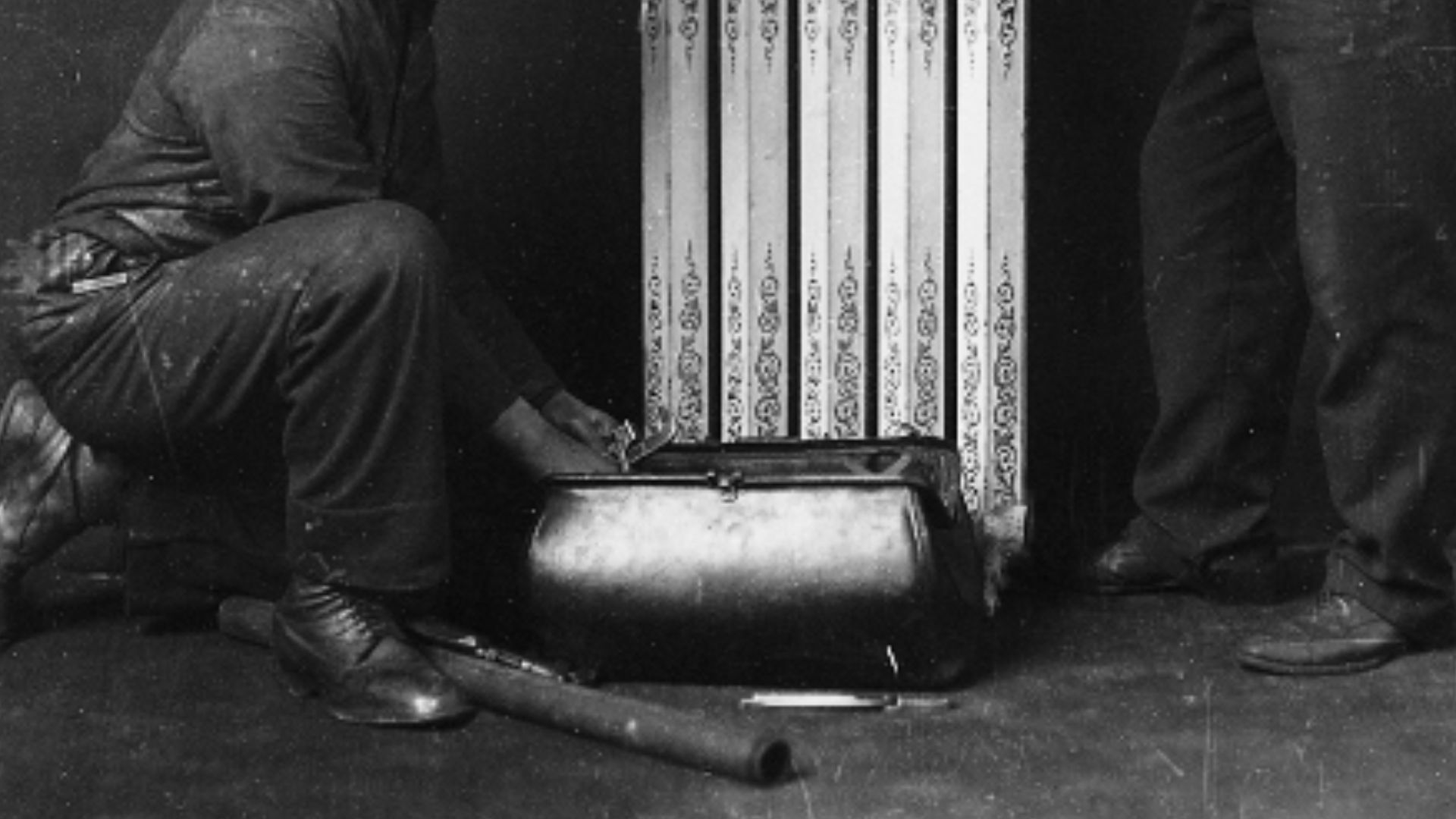 Photograph, Plumbers repairing hot water radiator, 1909, Wm. Notman & Son, Silver salts on glass - Gelatin dry plate process - 25 x 20 cm