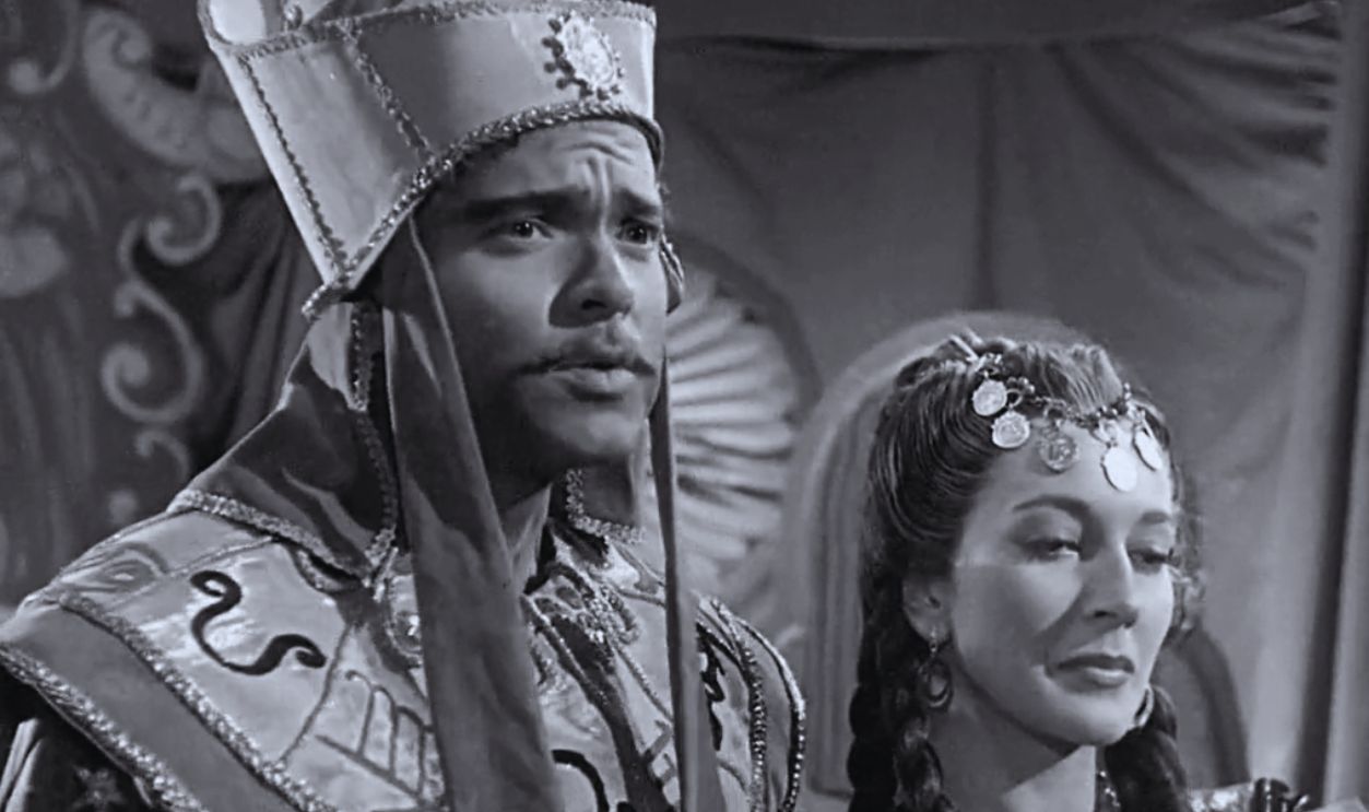 Screenshot from Black Magic (1949)