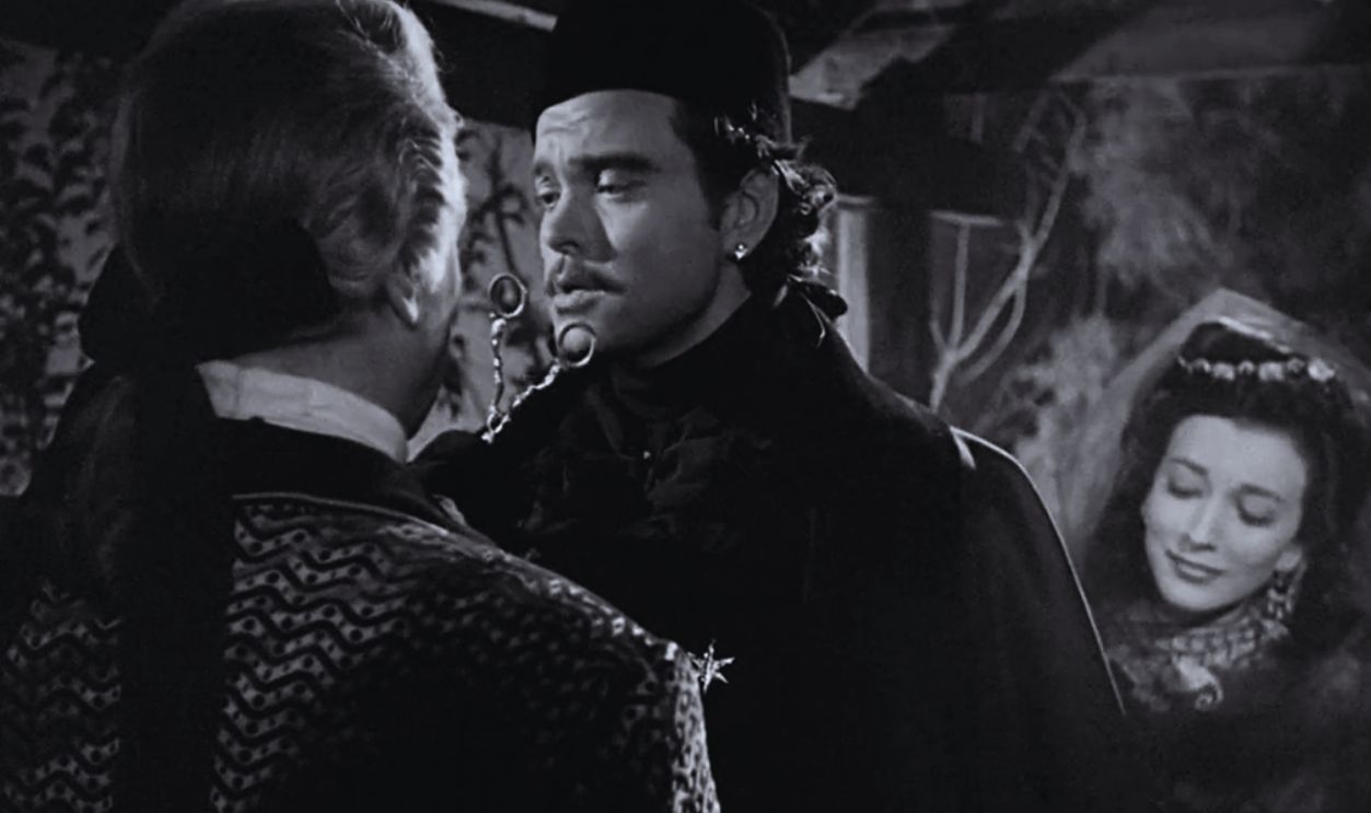 Screenshot from Black Magic (1949)