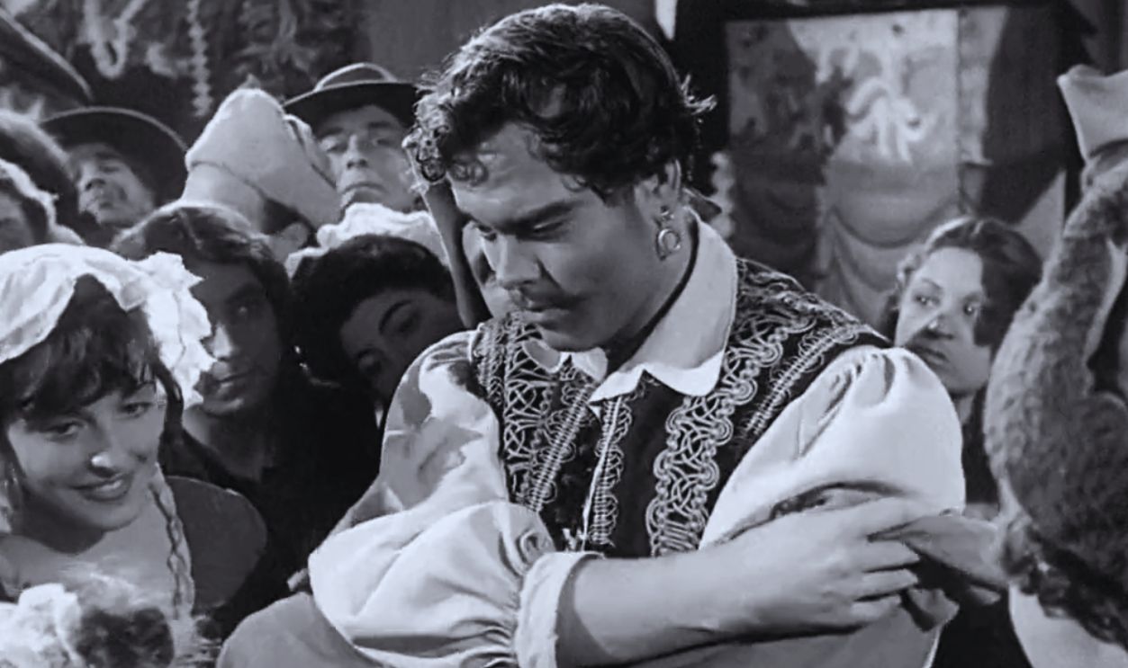Screenshot from Black Magic (1949)