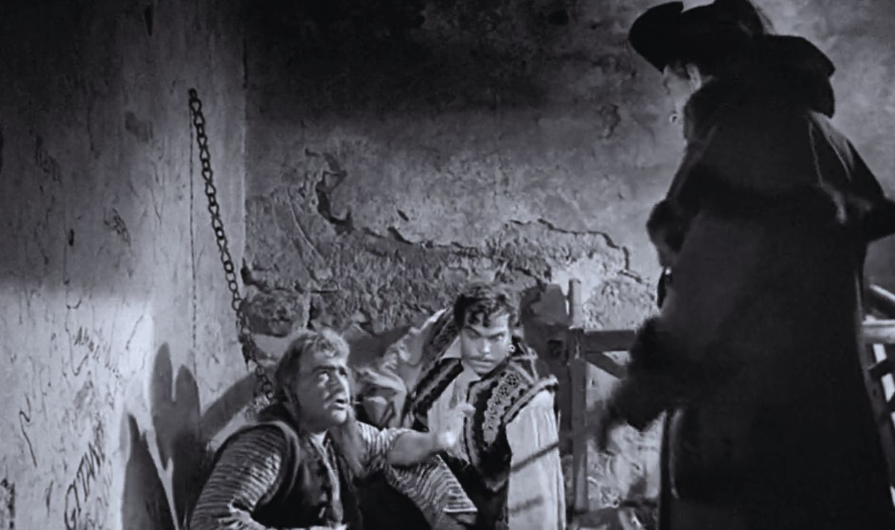 Screenshot from Black Magic (1949)
