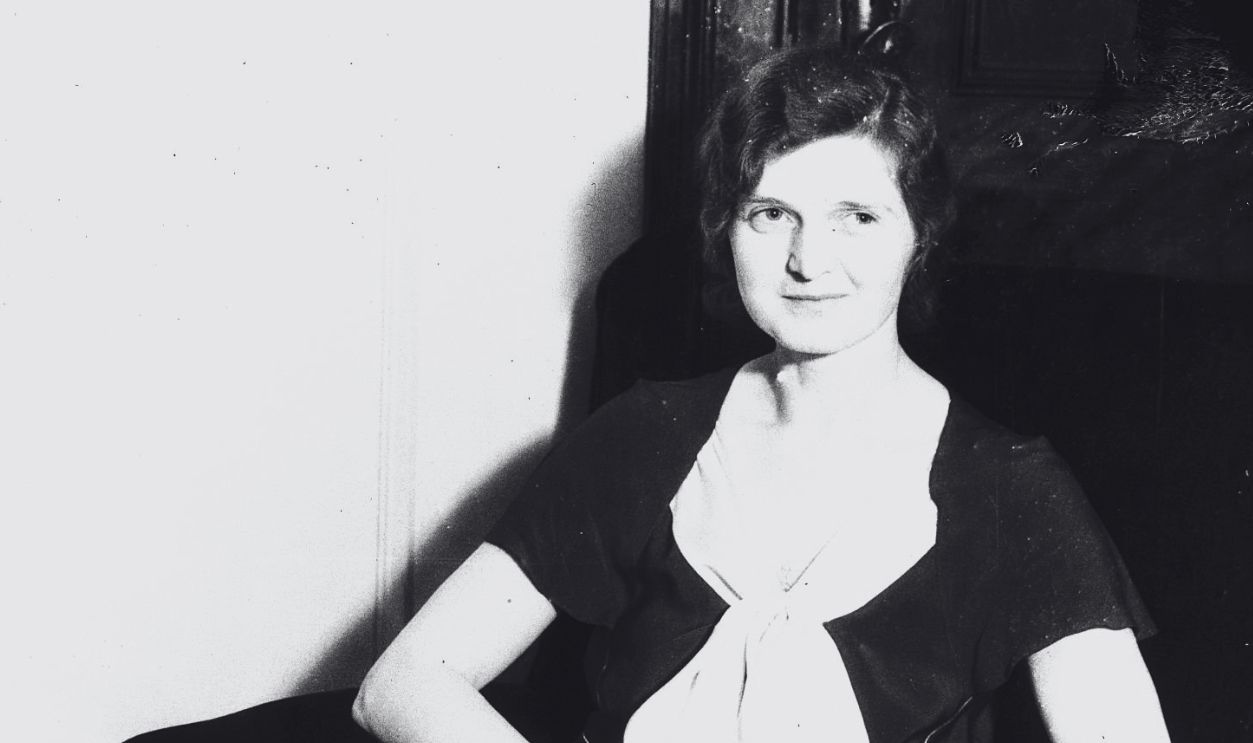 (Original Caption) A specially posed photo of Nan Britton, widely known as the author of The President's Daughter, made in Toledo when she arrived to press her $25,000 damage suit against C.A. Klunk, Marion, Ohio hotel keeper. Nan charges criminal libel in Klunk's book, The Answer to the President's Daughter. Miss Britton now lives in New Rochelle, New York.