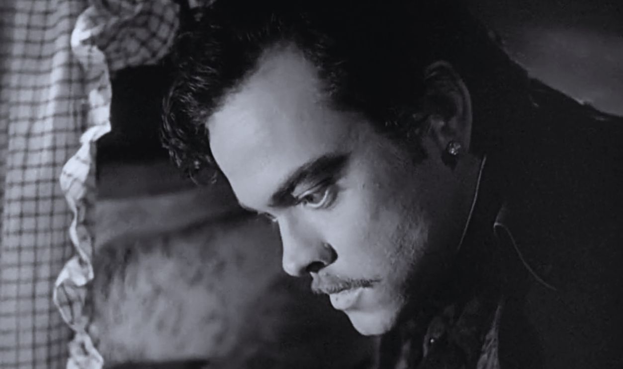 Screenshot from Black Magic (1949)