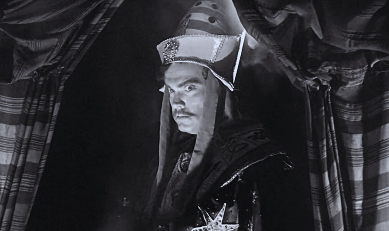 Screenshot from Black Magic (1949)