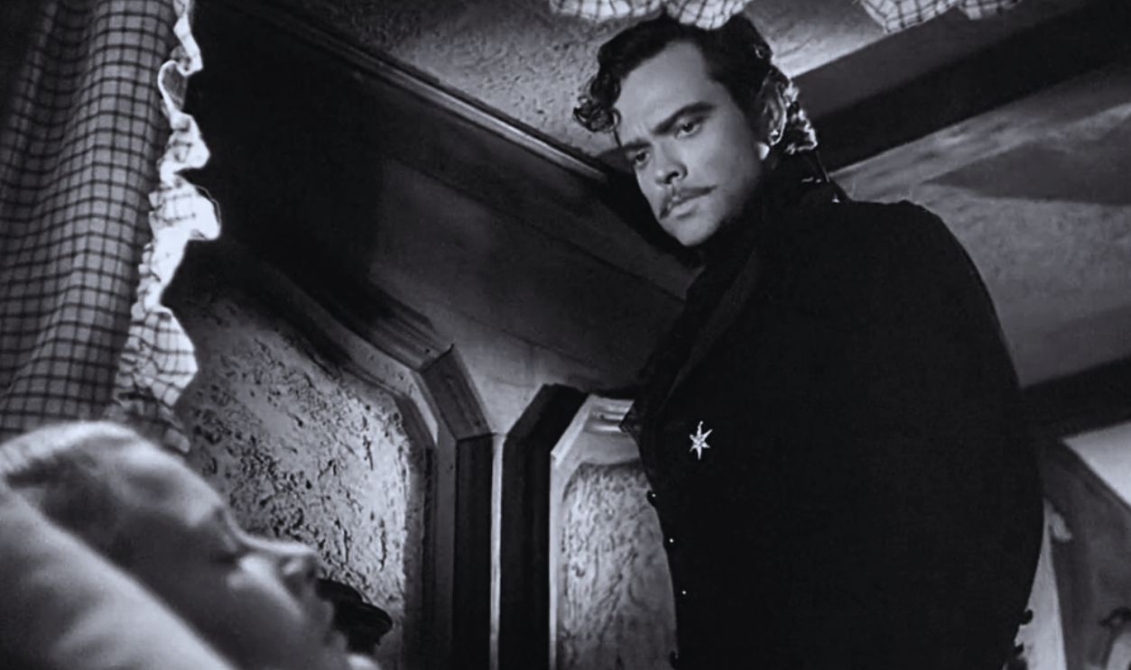 Screenshot from Black Magic (1949)