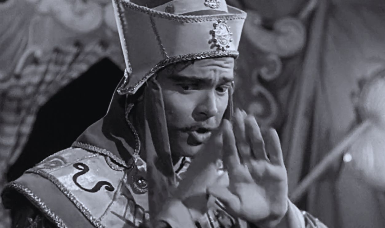 Screenshot from Black Magic (1949)