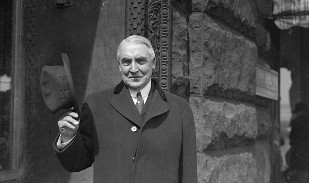 Informal portrait of Senator Warren G Harding (of Ohio), the 1920s Republican candidate for President, standing in front of the Auditorium Theater in the Loop community area, Chicago, Illinois, 1920. 