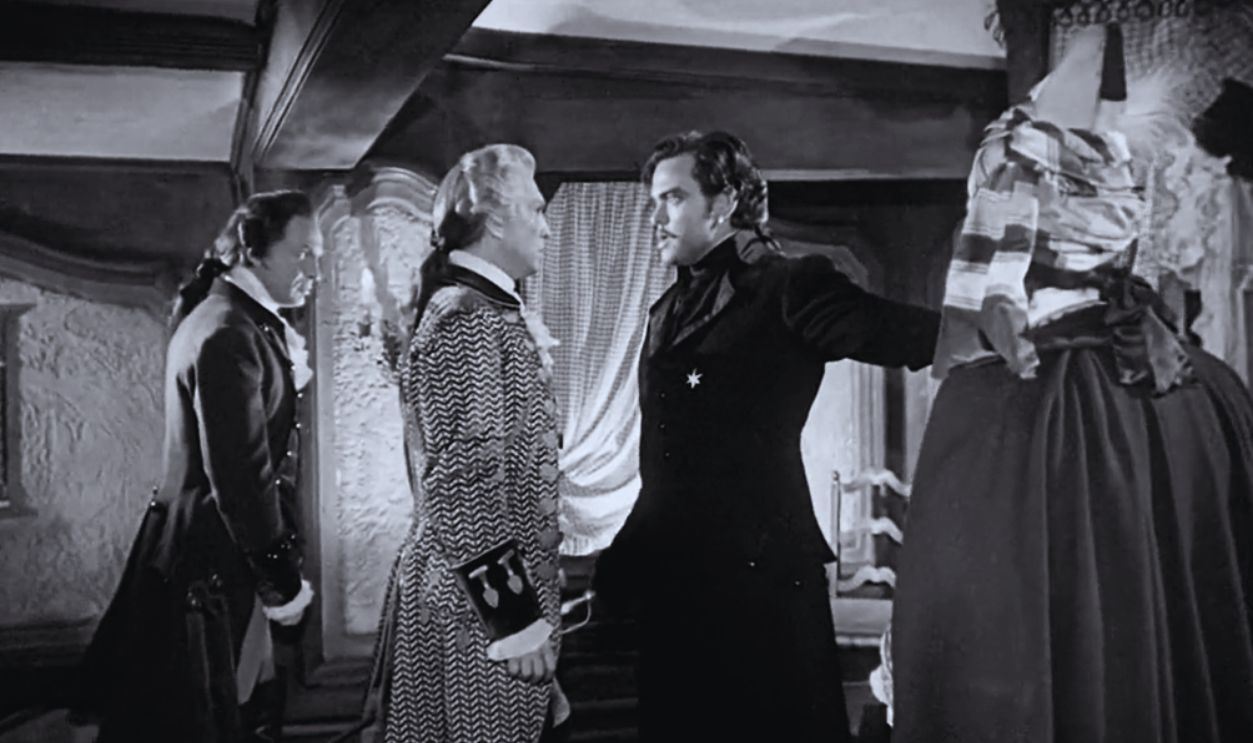 Screenshot from Black Magic (1949)