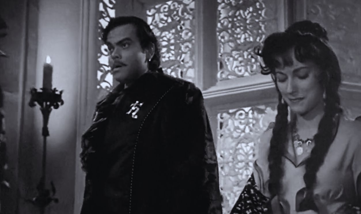 Screenshot from Black Magic (1949)