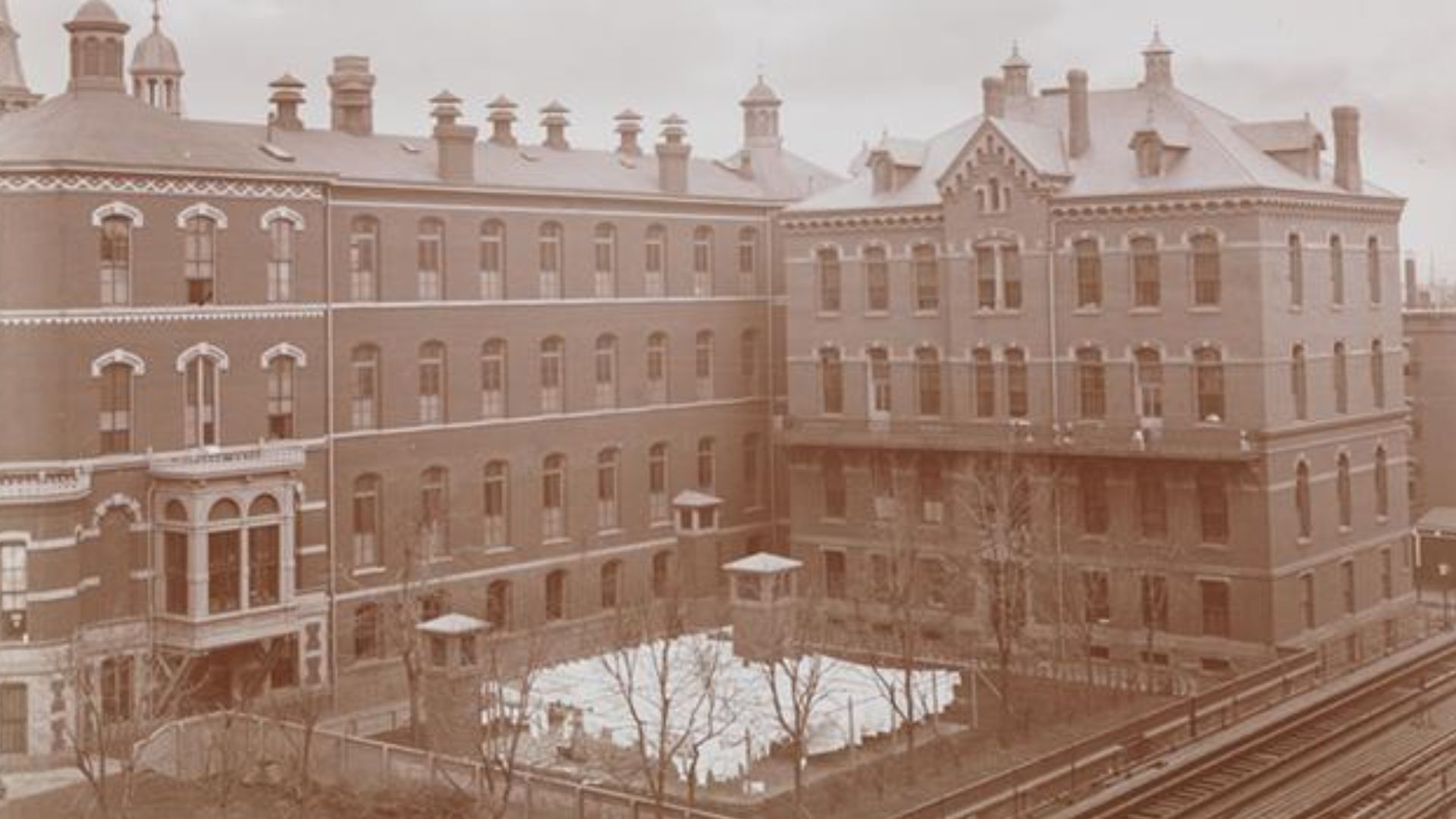 The New York Foundling Hospital on 3rd Avenue between 68th and 69th Streets. The elevated railroad is visible as well as laundry hanging on lines behind the Hospital building. The hospital was then an orphanage operated by the Sisters of Charity. The hosp