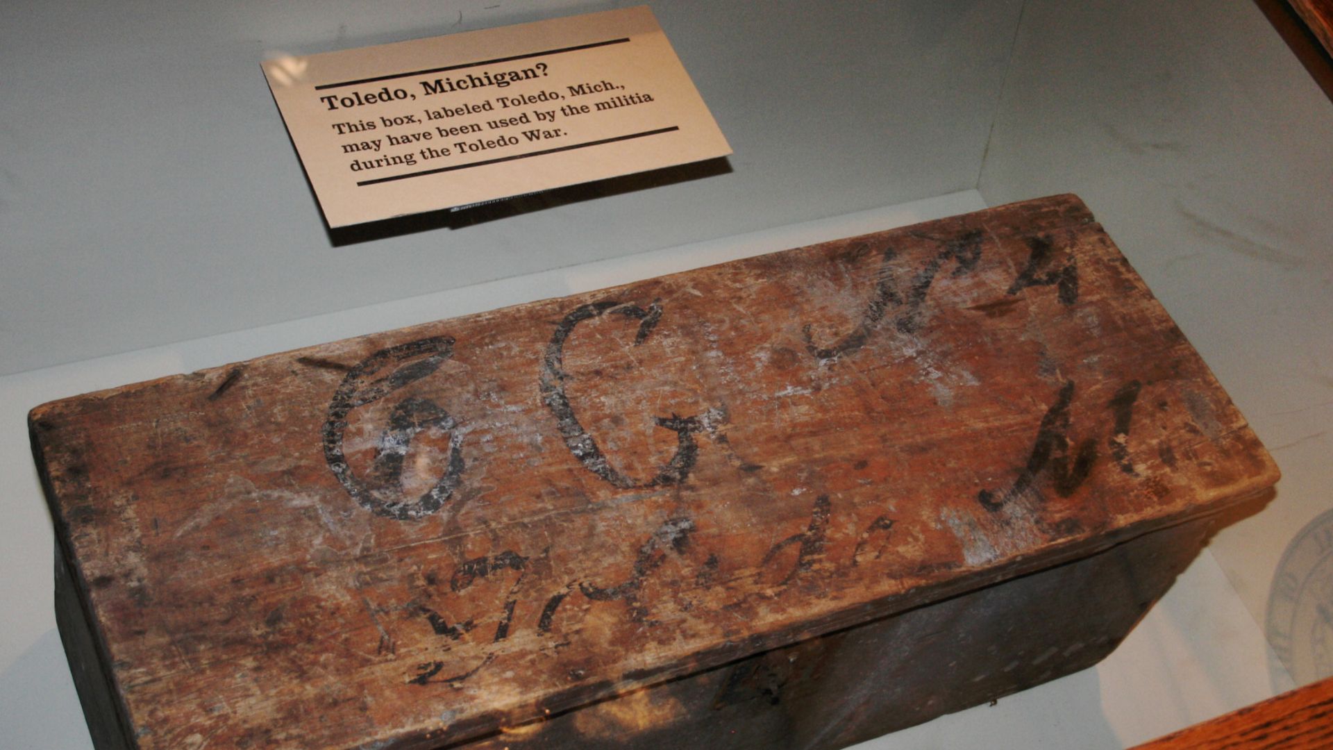 A photograph of a box with unknown lettering at the top and