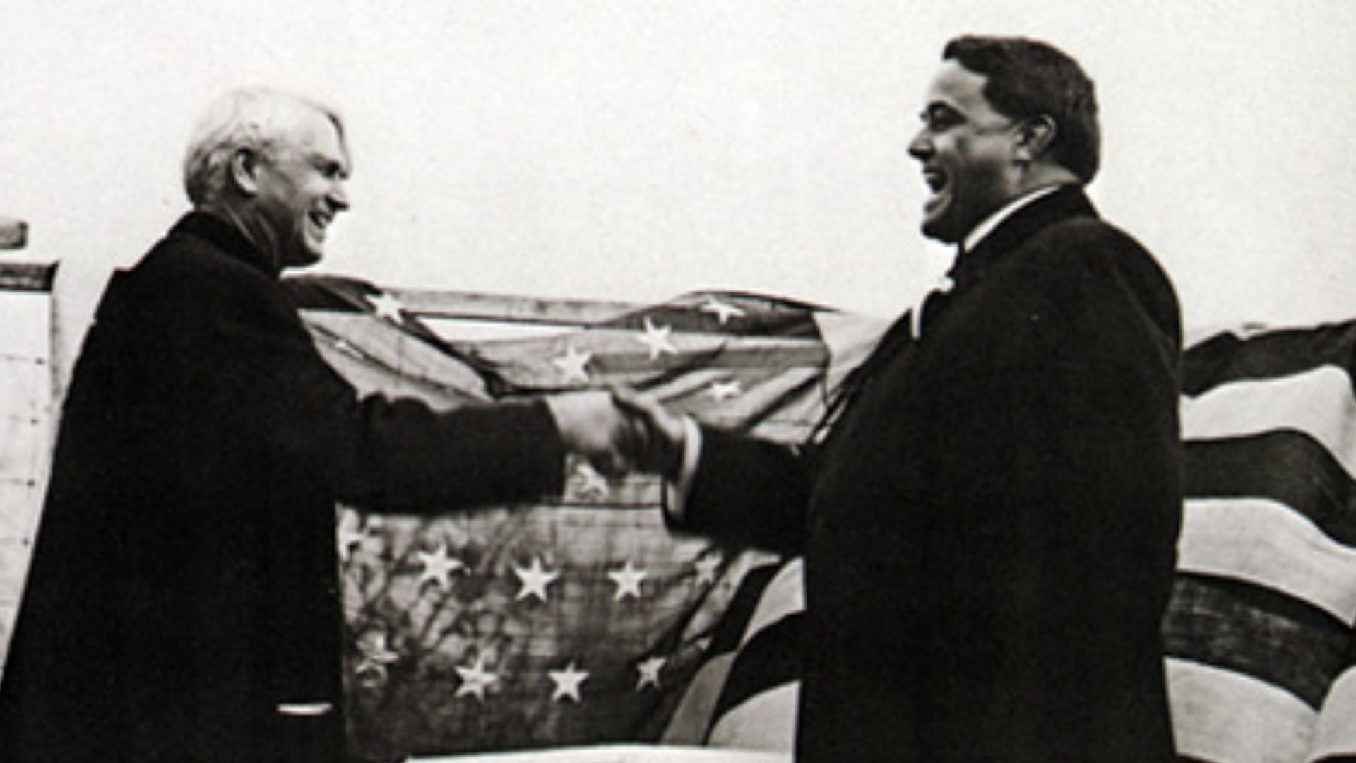 en:Michigan Governor en:Woodbridge Nathan Ferris and en:Ohio Governor en:Frank B. Willis shake on a