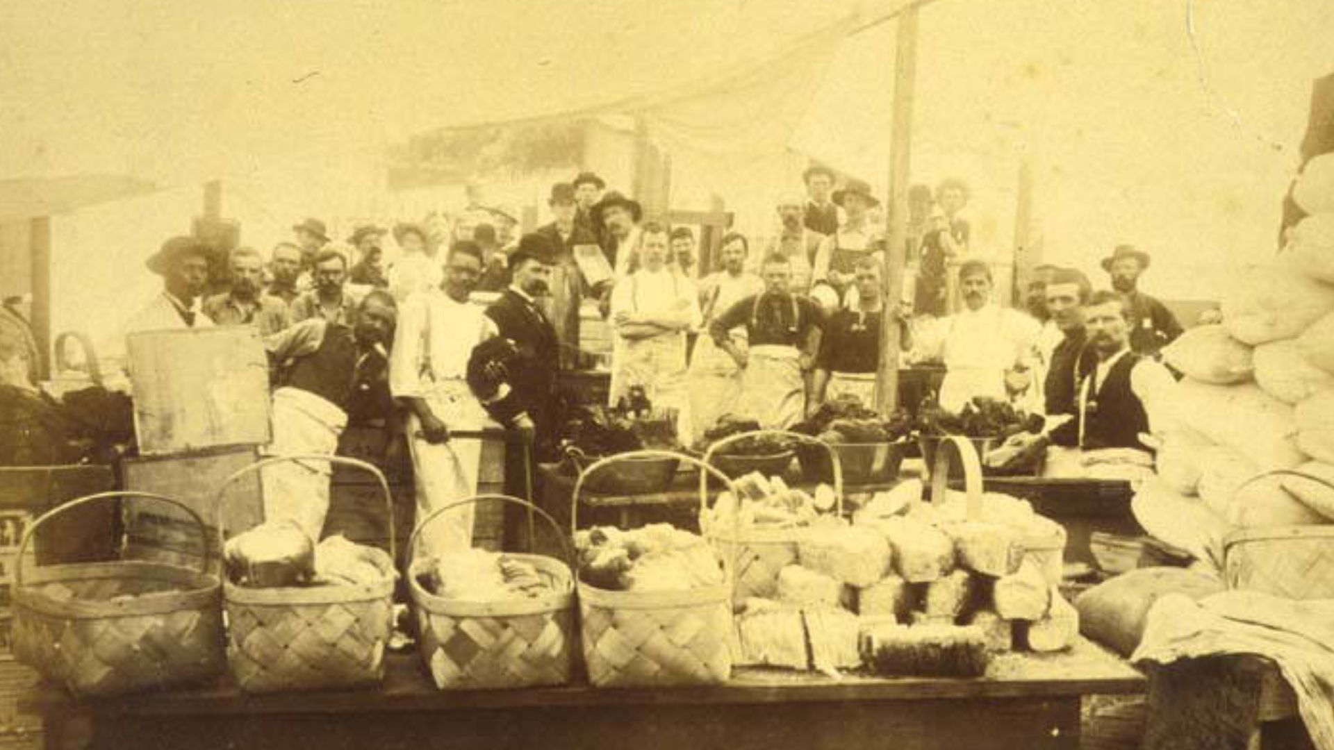 Shows relief workers and baskets and piles of bread and other food and supplies.
From William F. Boyd Album, page 54, right.
Subjects (LCTGM): Fires--Washington (State)--Seattle; Food relief--Washington (State)--Seattle
Subjects (LCSH): Tacoma Relief Bure