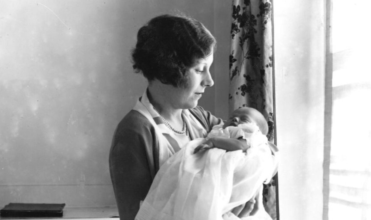 circa 1929: Barbara Cartland (1901 - 2000) (Mrs McCorquodale) with her new baby Raine. 