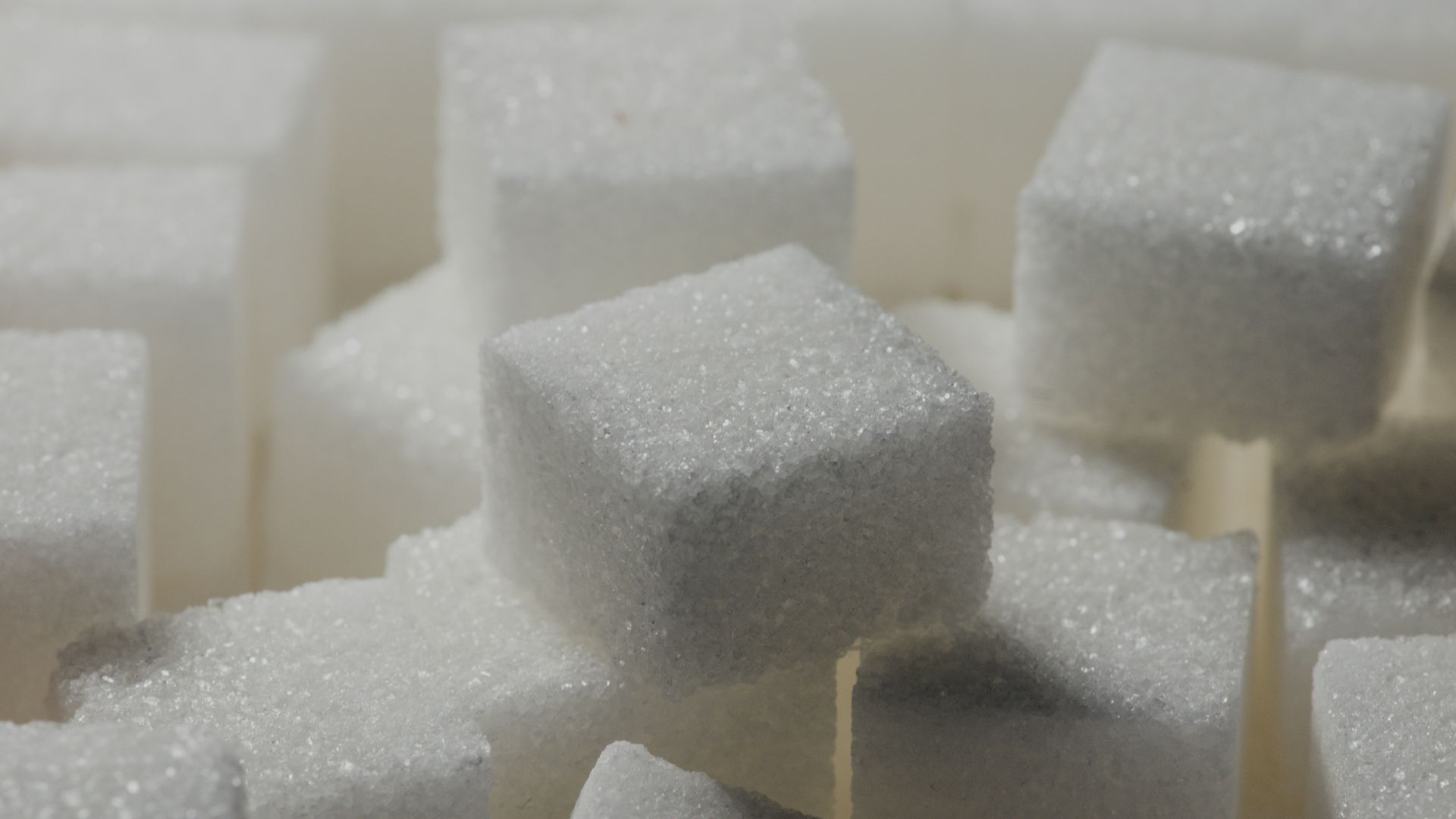 a pile of sugar cubes sitting on top of each other