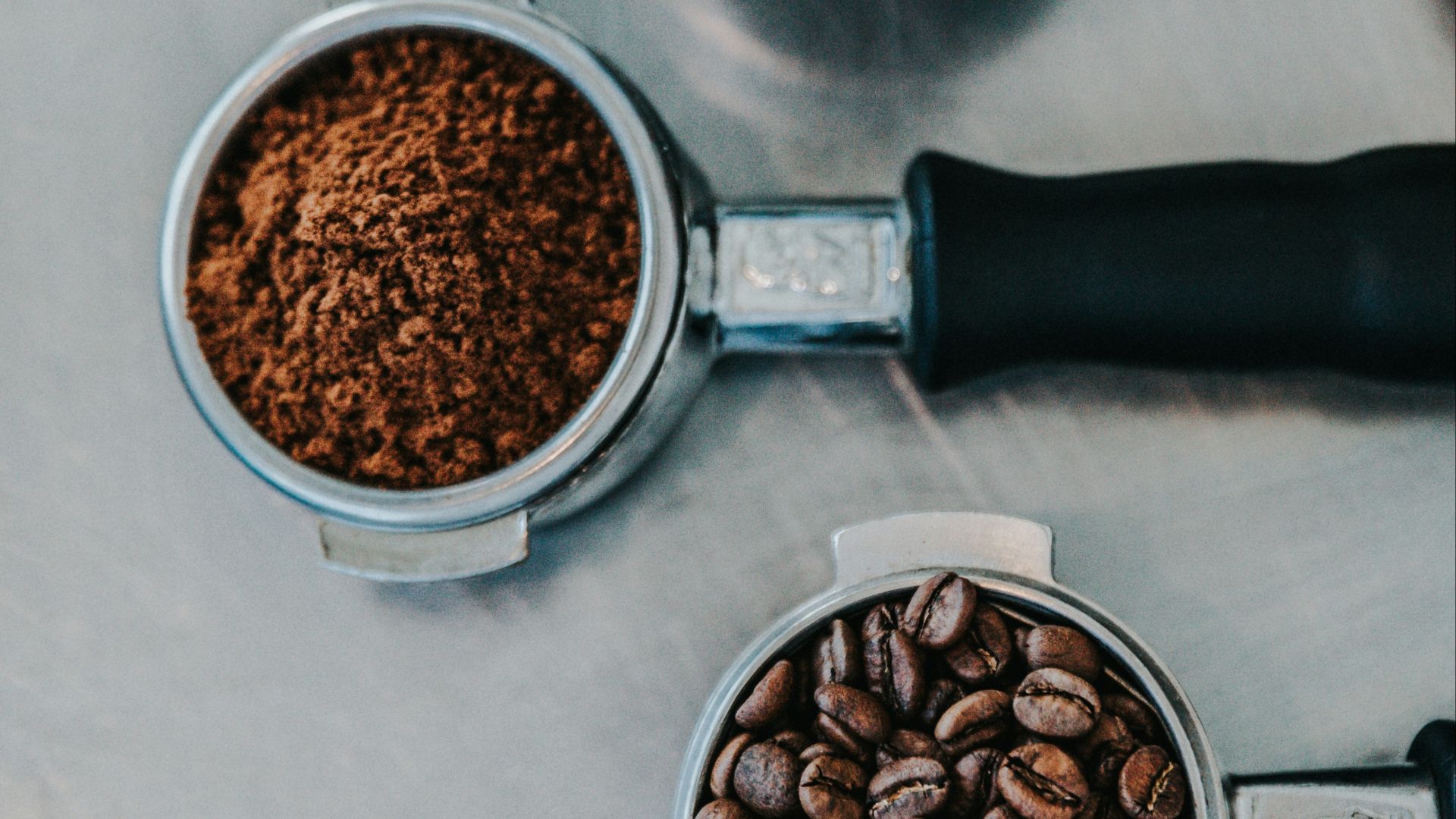 flat lay photography of coffee latte, ground coffee, and coffee beans