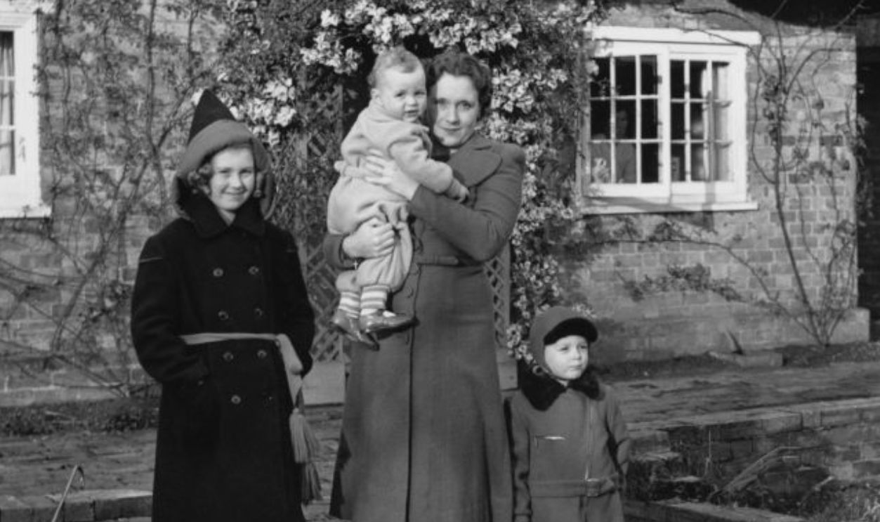 English author Barbara Cartland (1901 - 2000), the wife of Hugh McCorquodale, moves into River Cottage in Great Barford, Bedfordshire with her daughter Raine (12) and sons Ian (8) and Glen (10 months), having returned from Canada, 16th December 1940. Their home in Grosvenor Square has been bombed.