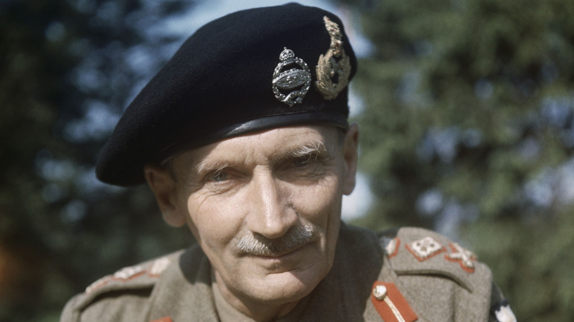 General Sir Bernard Montgomery in England, 1943
Half-length portrait of the Commander of the Eighth Army General Sir Bernard Montgomery wearing his tank beret, taken during a visit to this country.

The image is unattributed at IWM but there are other col