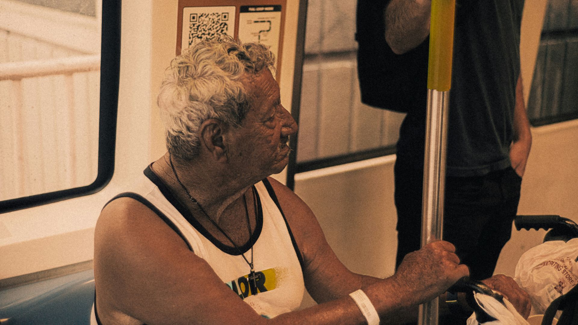 A man and a woman sitting on a train