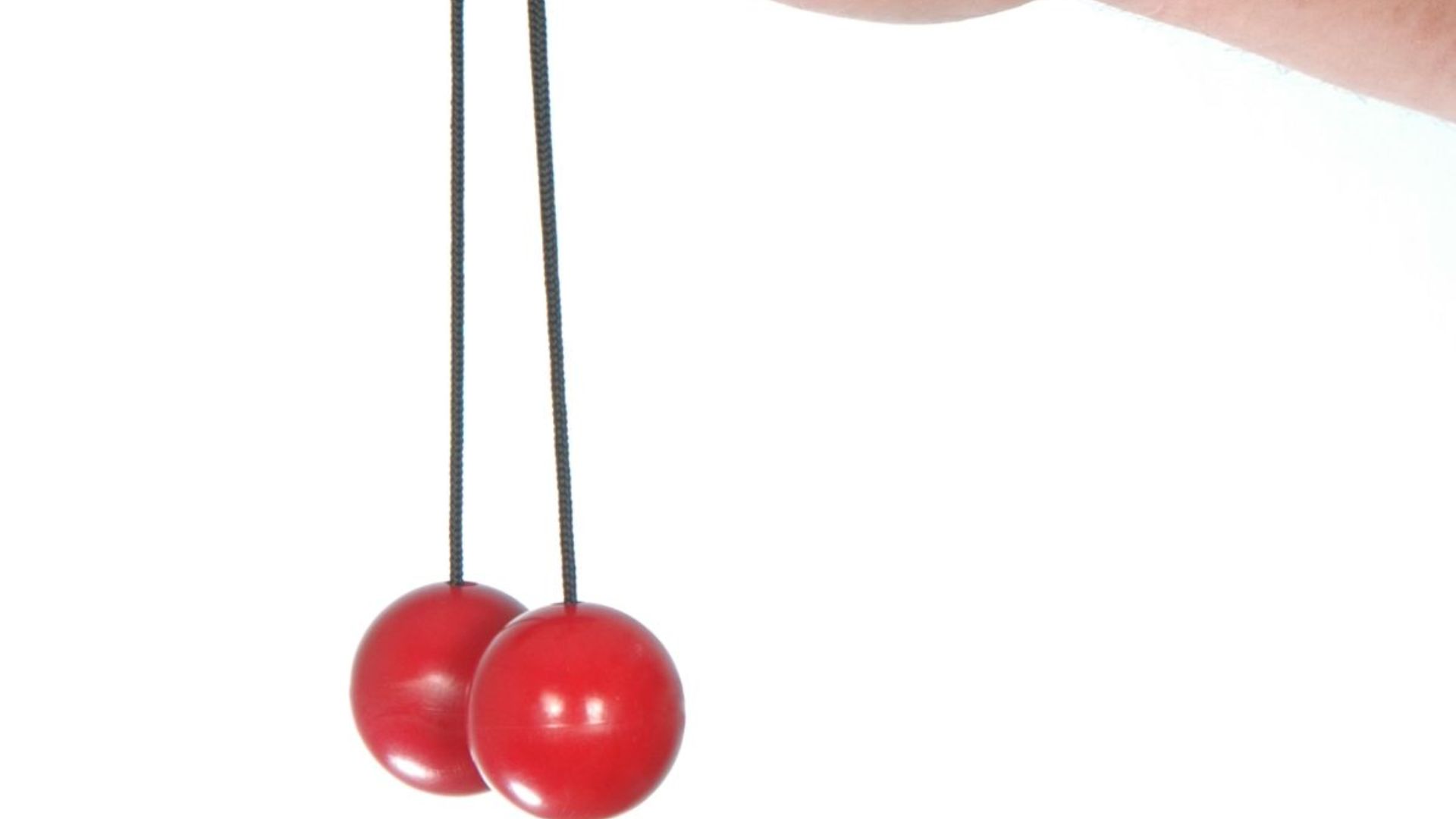 Způsob držení kliklaku mezi prsty