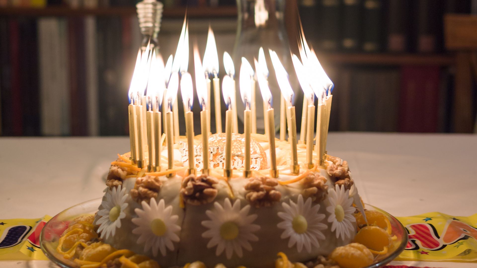 With lit candles