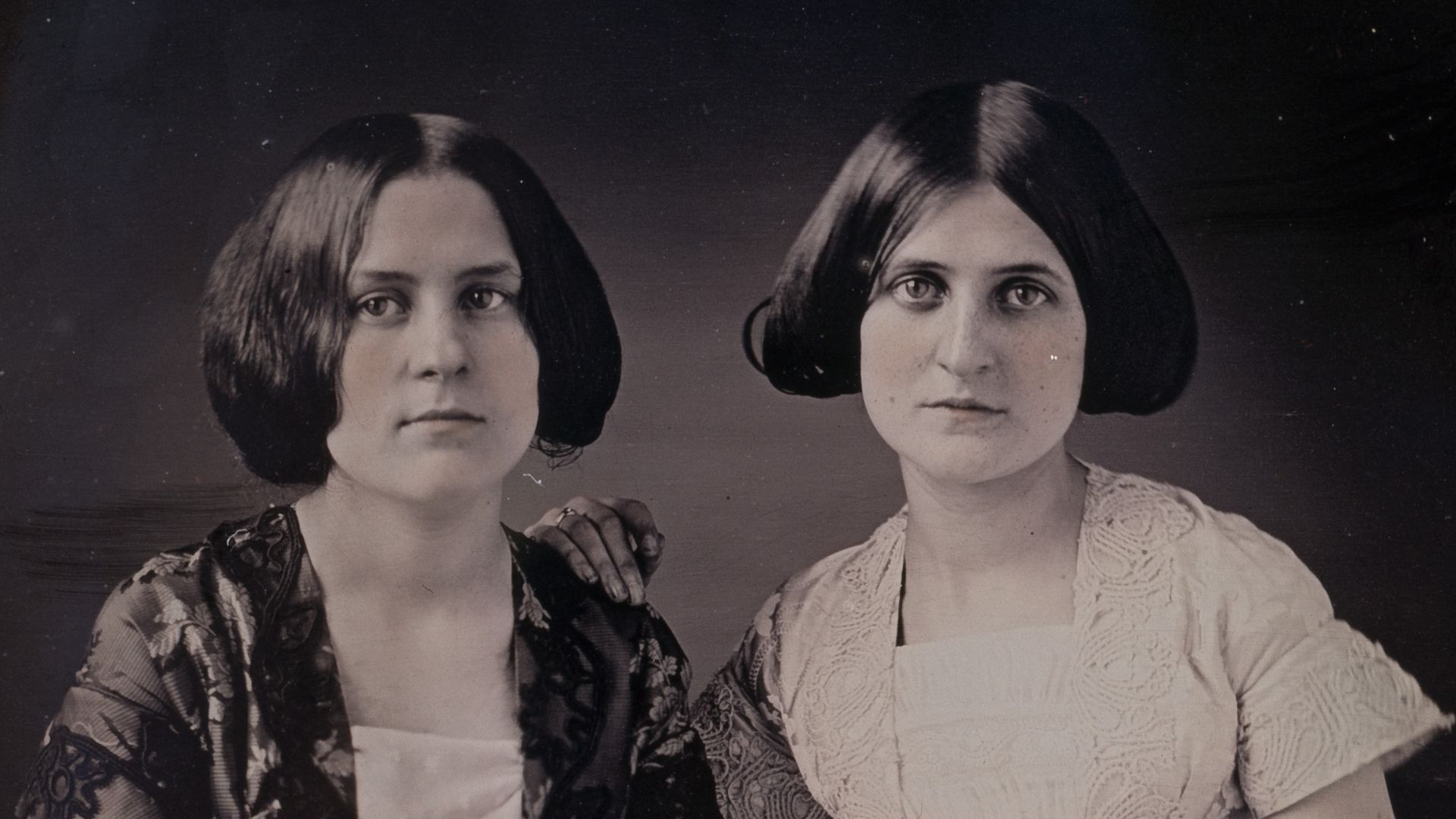 Portrait of Kate and Maggie Fox, Spirit Mediums from Rochester, New York. Along the bottom edge of the daguerreotype